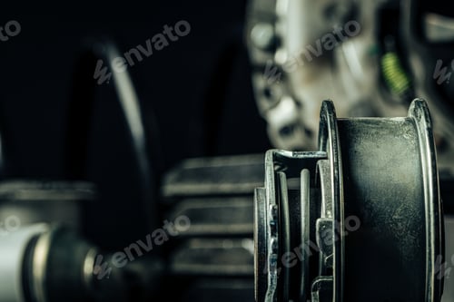 Preview: Close up of new car parts on black background
