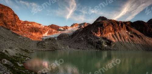 Preview: Panoramic View of Vibrant Colorful Glacier Lake up in Rocky Mountains