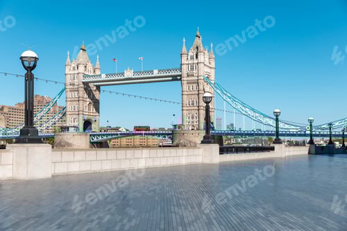 Preview: Tower Bridge in London with empty riverside walk due to coronavirus lockdown