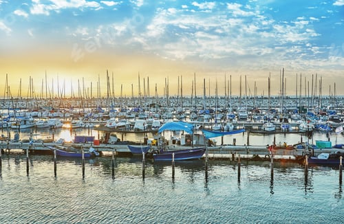 Preview: Marina with yachts on the mediterranean sea at sunset