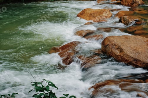 Preview: rocky bed of river, fast mountain stream with roiling stream.