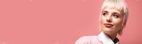 Preview: Portrait of a young beautiful woman with a playful expression against a soft pink background