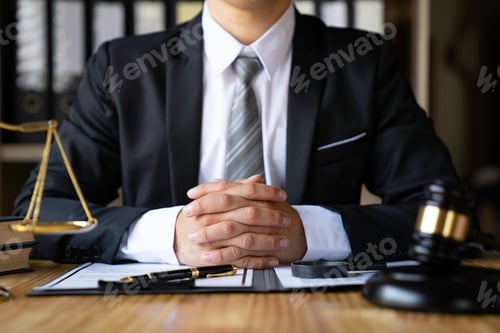 Preview: Attorney reading law code, studying constitution to protect human rights closeup, Male lawyer or jud