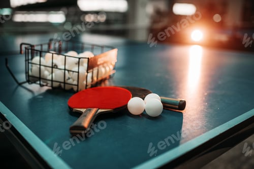 Preview: Ping pong table, rackets and balls in a sport hall