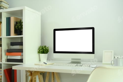 Preview: Mock up computer monitor, houseplant, notebook and coffee cup on white table