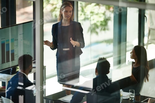 Preview: Shot of a corporate businessperson giving a presentation in the boardroom