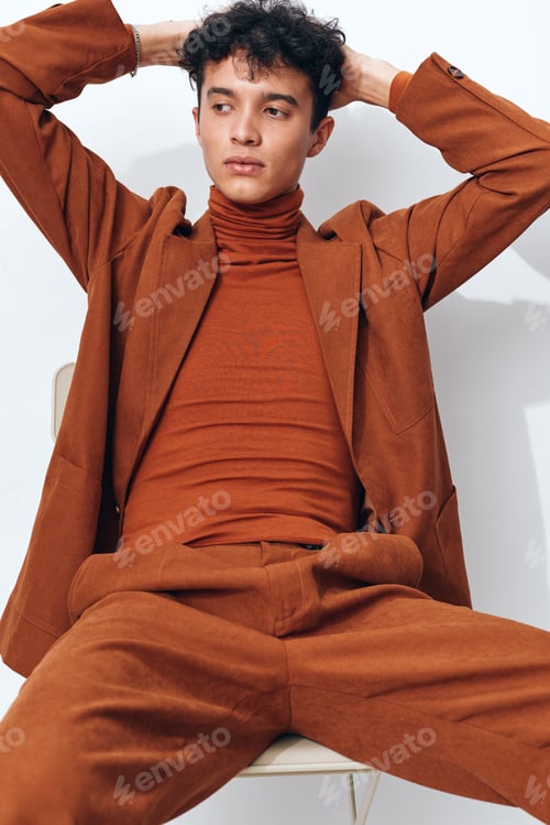 Preview: Man face thoughtful lifestyle serious portrait fashion sitting trendy hipster student beige