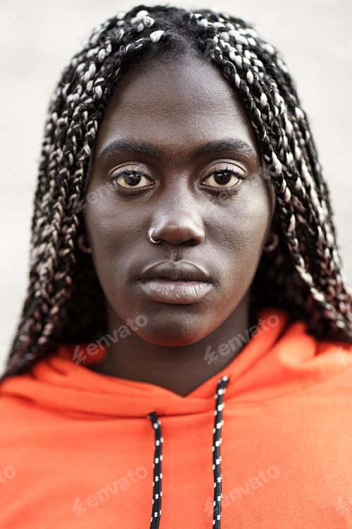 Preview: Closeup portrait of an African woman with dreadlocks