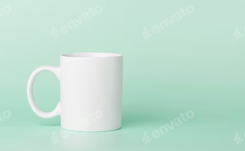 Preview: white cup for tea or coffee on a green background
