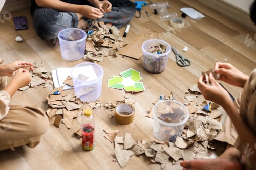 Preview: Overhead View Of Group People Working Together On Eco Friendly Craft Project