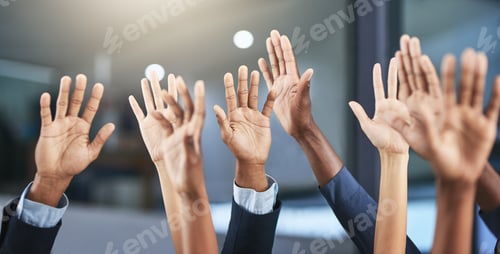Preview: Pick us. Cropped shot of a group of businesspeople raising their hands.
