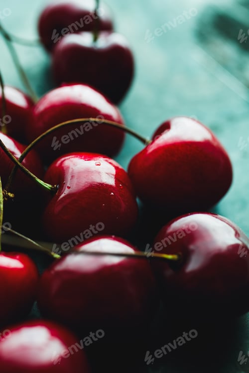 Preview: Ripe cherries on green