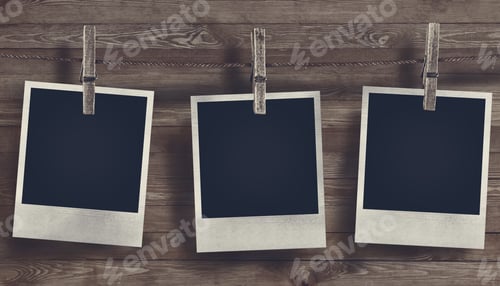 Preview: Blank Photo frame on wooden background