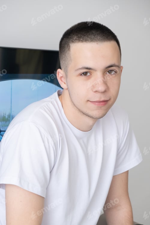 Preview: portrait of a young guy in a white t-shirt