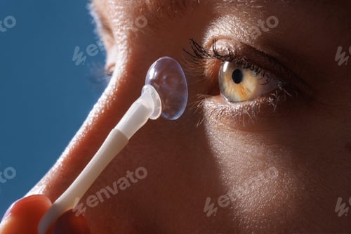 Preview: Macro Close Up of Eye Applying Contact Lens for Vision Improvement and Glasses Replacement