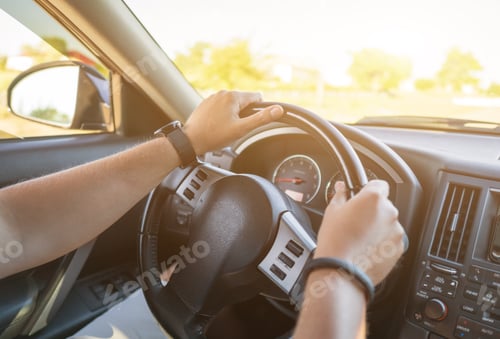 Preview: Driver's hands and steering wheel