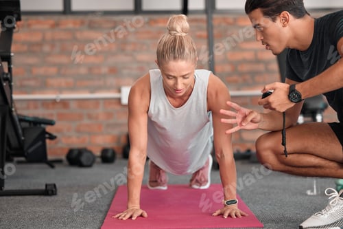 Preview: Fitness, push up and woman with personal trainer, partner or gym coach for support, performance che
