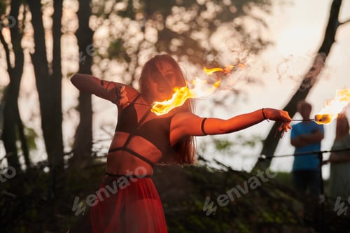 Preview: Girl fire dancing performance at outdoor art festival, smooth movements of female artist