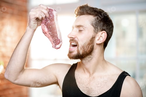 Preview: Sports man portrait with meat