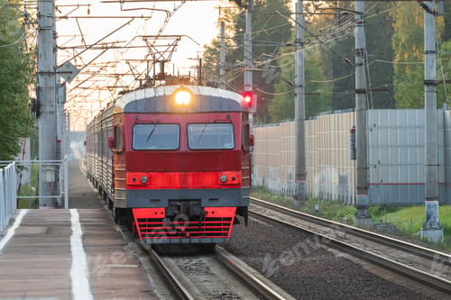 Vista previa: Suburban electric train arriving to station. Passenger commuter train wagon coming to empty platform