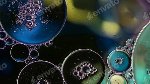 Preview: Abstract Colorful Food Oil Drops Bubbles and spheres Flowing on Water Surface