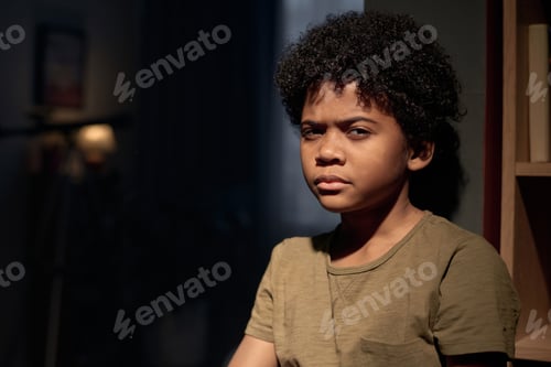 Preview: Black Boy Looking at Camera with Serious Face