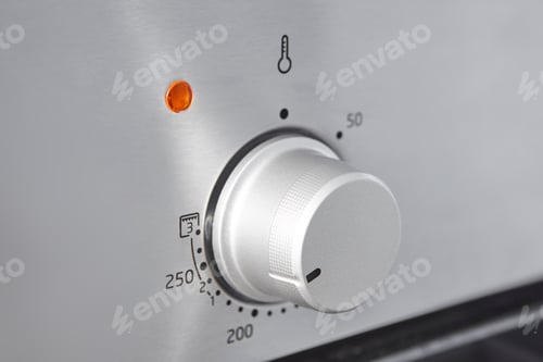 Preview: Oven cooking temperature control knob. Kitchen equipment panel detail. Stove