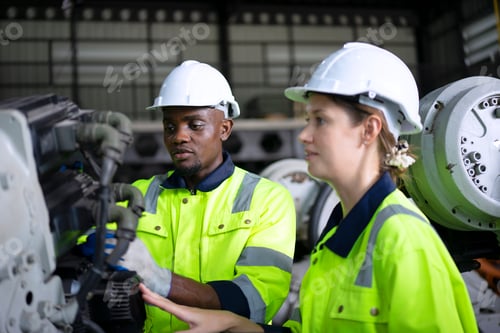 Preview: Engineer work at robotic arm factory.