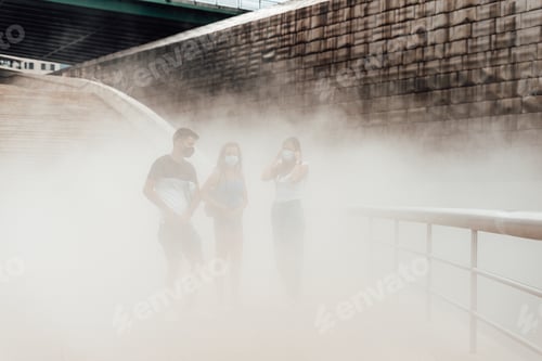 Preview: Three people with masks on a pollution cloud