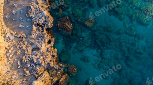 Preview: Secret Beach on Rocky Shore and Blue Waters, Greek Island, Drone