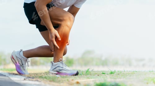 Preview: Runner Holding Painful Knee After Running Exercise