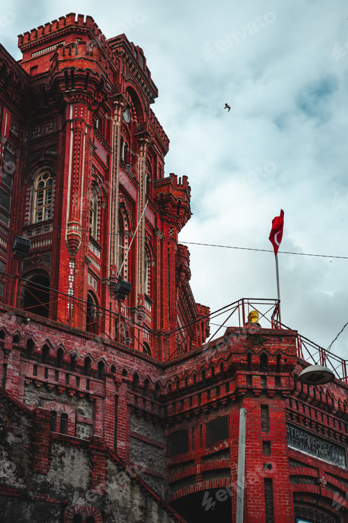 Preview: Red building with people on balcony in Istanbul, Turkey
