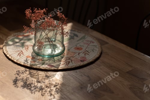 Preview: flowers in vase on wood table as festive delicate modern home decor for soft light interior