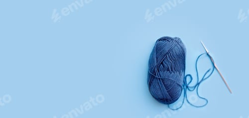 Preview: Ball of Blue Yarn with Crochet Hook