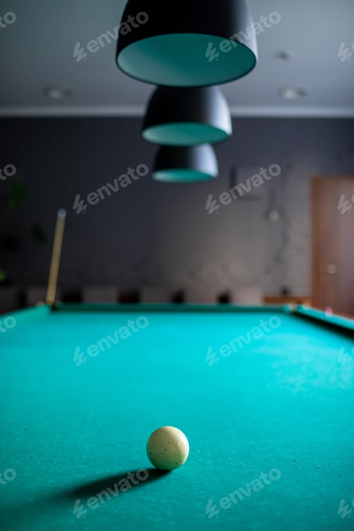 Preview: Playing billiard. Billiard white ball on green billiards table. Billiard sport concept. Pool