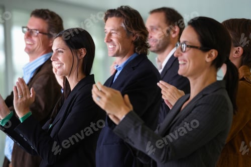Preview: Business team applauding, smiling