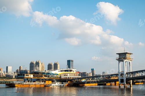 Preview: Scenic view of cumulonimbus clouds over the docks and ships along the Yangtze River