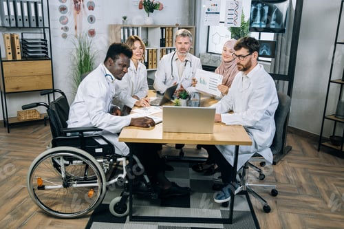 Preview: Diverse medical workers having video conference on laptop