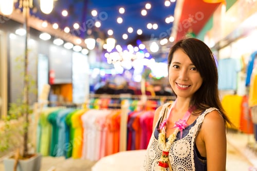 Preview: Woman in night street market