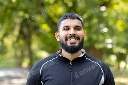 Preview: Man in athletic wear enjoying a peaceful park