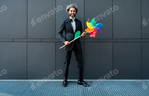 Preview: image of a young entrepreneur going to work in his successful start up business