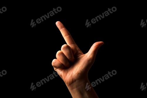Preview: Hand Showing Sign of L Alphabet in American Sign Language (ASL), isolated on black background.