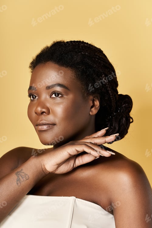 Preview: Showcasing the elegance of a young Black woman's beautiful skin in studio light