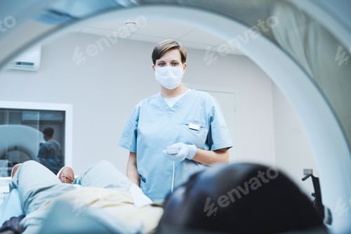 Preview: Radiologist providing diagnostic imaging of patient