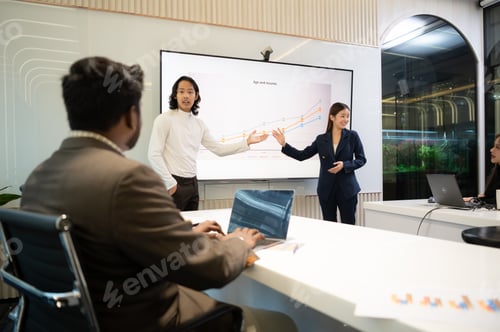 Preview: Business people having a meeting and present in a conference room at the office.