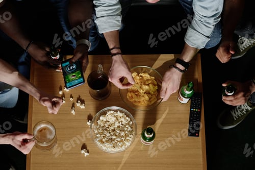Preview: Unrecognizable Friends Watching Soccer Match