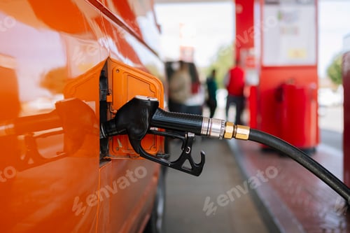 Preview: Hose filling the tank of your vehicle with the gas station hose