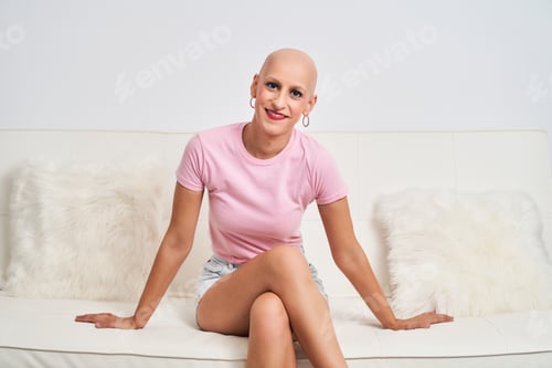 Preview: portrait of Woman with cancer sitting relaxed optimistic positive looking at the camera