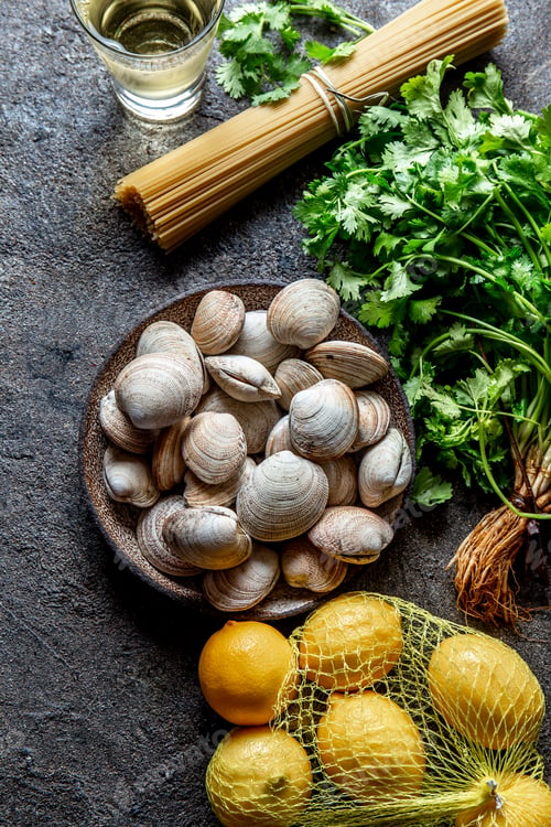 Preview: Shellfish seafood clams almejas with cilantro, pasta, lemon and white whine.