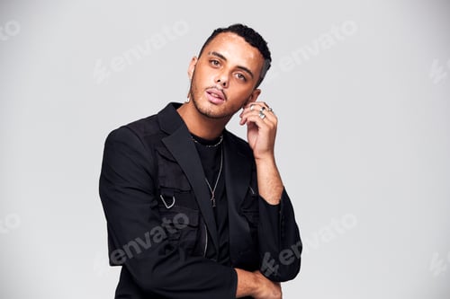 Preview: Studio Portrait Of Young Man With Skin Pigmentation Disorder Looking At Camera